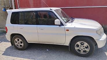 mitsubishi eclipse: Mitsubishi Pajero iO (GDI) – ağ rəngli, 5 qapılı yolsuzluq/siti — 4
