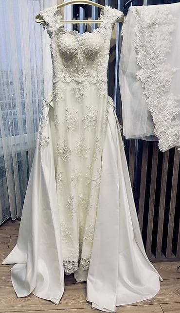 Gəlinlik – klassik A-kəsim, bədən quruluşunu vurğulayan ətəkli model -