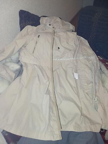 Bej rəngli qadın yağmurluq/parkа - Rəng: açıq bej - Model: beldən lalafo.az -da Bej rəngli qadın yağmurluq/parkа - Rəng: açıq bej - Model: beldən