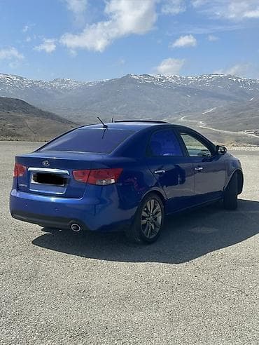 park maşını: Kia Cerato: 2 l | 2009 il Sedan — 7
