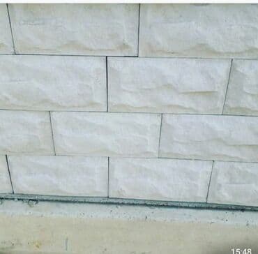 fasad kafelləri: Fasad üçün müxtəlif rəng və fakturalı dekorativ daş panelləri. Bu — 31