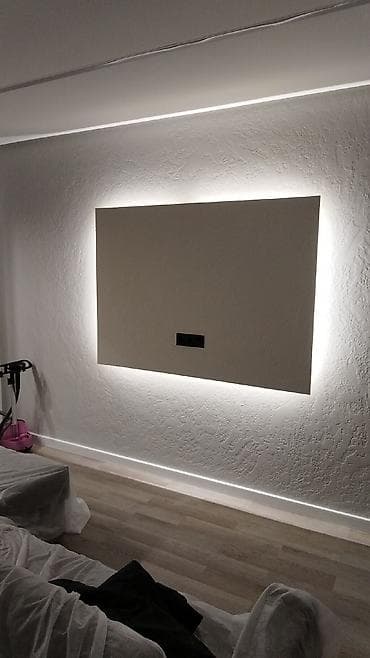 LED xətləri və gizli işıqlandırma ilə alçıpan tavan və divar dizaynı