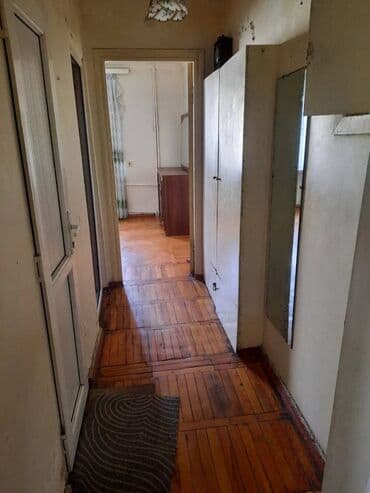 Xətai metrosunun yaxınlığında 5 mertebeli binanın 4-cü mərtəbəsində — 4