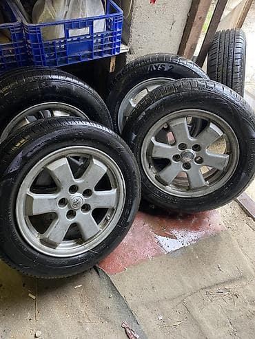 Шины: Toyota orijinal yüngül lehimli disklər və şinlər komplekti - — 1