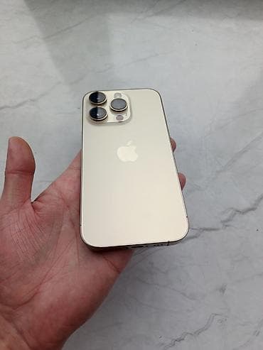 telefonlar iphone: IPhone 14 Pro, 128 GB, Qızılı, Simsiz şarj — 1