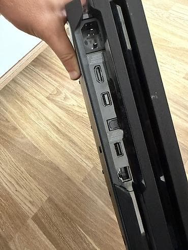 13 pro max pil: Sony PlayStation 4 Pro (PS4 Pro) oyun konsolu - Model: PS4 Pro, 4K — 4