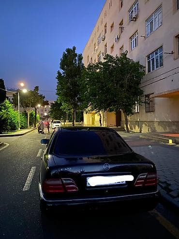 disk qabi: Mercedes-Benz E 320: 3.2 l | 1995 il Sedan — 3