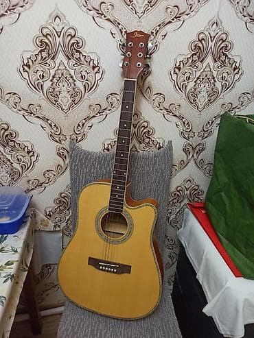 gitara temiri: Smiger Gah61n Akustik gitara satılır. Az istifadə olunub. Sınığı — 1