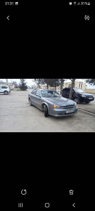 niva satilir: Chevrolet Evanda: 2 l | 2005 il 35000 km Sedan — 7
