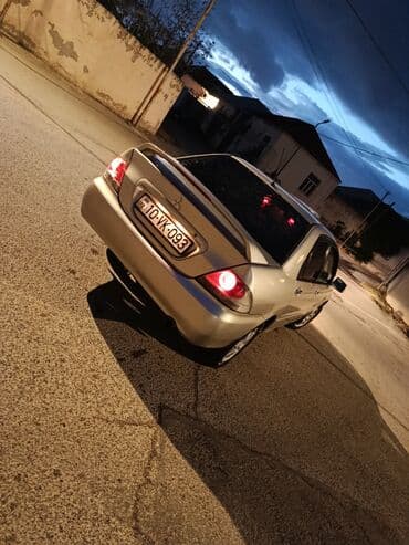 Ehtiyat hissələri: Mitsubishi Lancer sedan - Kuzov: 4 qapılı sedan, gümüşü rəng - — 4