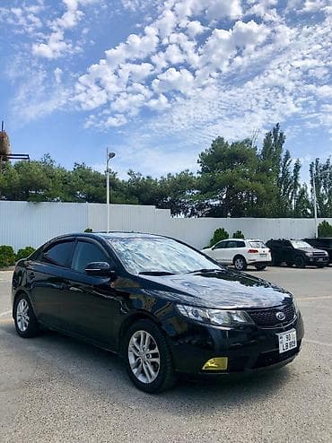 disk qabi: Kia Cerato: 1.6 l | 2011 il Sedan — 1
