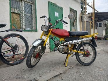 купить мапед: Sarı-çəhrayı rəng sxemində klassik moped. Xüsusiyyətlər: - Yüngül — 3