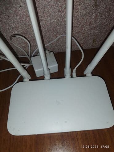 xiomi modem: XIAOMI MI modemi, 4 antenli - 35 
Qara TP-link modemi, 3 antenli - 35 — 1