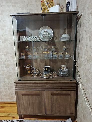 Şüşəli dolab vitrini, İşlənmiş, Ünvandan götürmə
