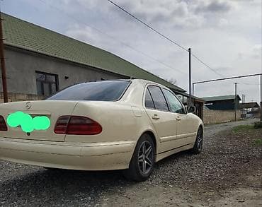 daewoo damas qiymeti: Mercedes-Benz E-Class (W220) sedan - Korpus: açıq bej rəng, 4 qapı — 2