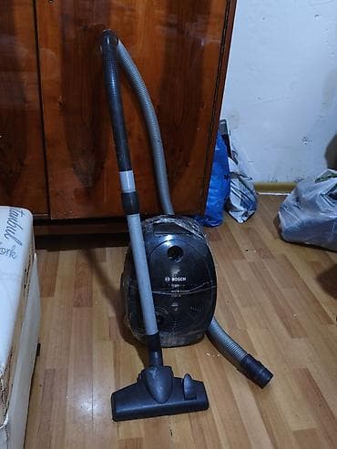 tostur: Bosch “logo” seriyalı tozsoran – 2100 W güc. Xüsusiyyətlər: - Güclü — 1
