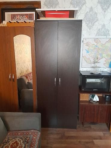 Dolab eni 0.80,hundurluyu 2 metr qara rengde.əla vəziyyətdə