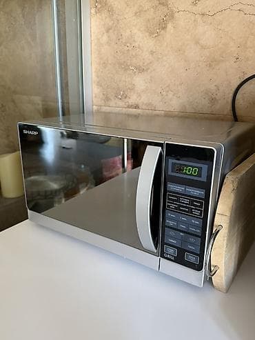 SHARP mikrodalğalı soba – qril funksiyalı, güzgü effektli ön panel və lalafo.az -da SHARP mikrodalğalı soba – qril funksiyalı, güzgü effektli ön panel və