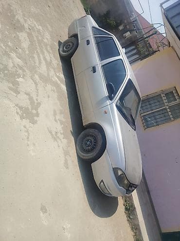 Daewoo Nexia sedan, gümüşü rəng. - Kuzov: 4 qapı, arxa spoyler