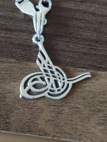 gumuş boyunbagı: Boyunbağı, Gümüş, Ünvandan götürmə — 1