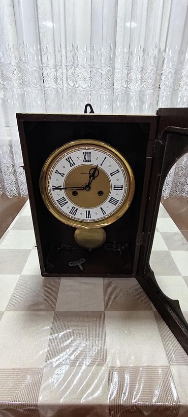 islenmis generator satisi: Divar saatları, Mexaniki, Mayatnik — 5