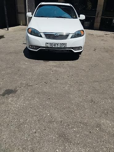 traxtor satisi: Daewoo Gentra sedan – ağ rəng, şəhər və magistral üçün universal rahat — 8