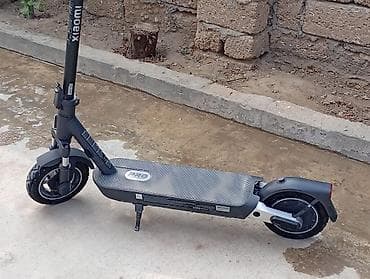 Elektrik samokat 11", > 1000 Vt, 26 - 35 km/s