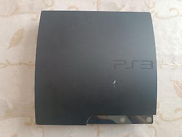 plesteyşin 3: PlayStation 3 Slim oyun konsolu - Model: Sony PS3 Slim (üst paneldə — 2