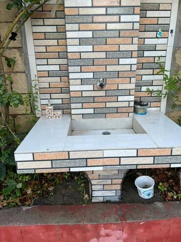 yeni evlər: 7 otaqlı, 320 kv. m, Yeni təmirli — 12