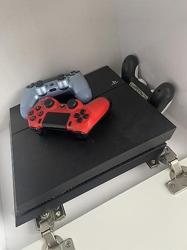 playstation 4 1 tb pro: PlayStation 4 oyun konsolu paketi - Model: PS4 (şəkildə göstərilən — 3