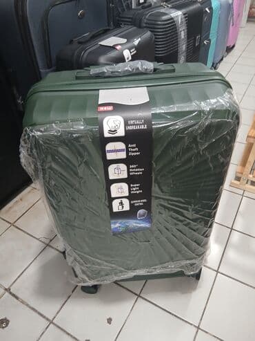 купить чемодан на колесах: Dörd təkərli səyahət çantası, möhkəm materialdan hazırlanmışdır və — 12