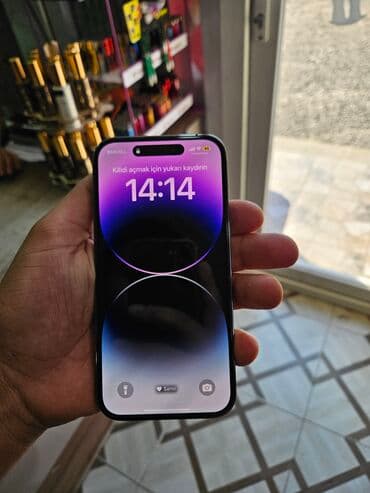 beko 8: IPhone 14 Pro, 128 GB, Mərcanı, Face ID, Barmaq izi, Simsiz şarj — 1
