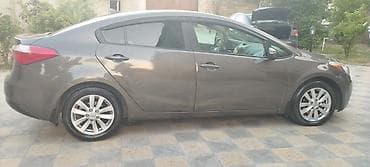 авто руль: Kia Forte: 1.8 л | 2013 г. Седан — 5