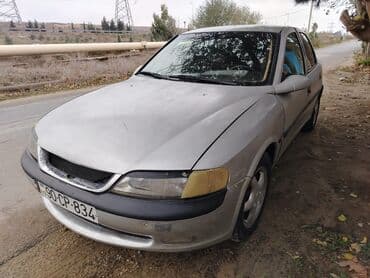 masin tozsorani: Opel Vectra B sedan - Kuzov: 4 qapılı sedan, gümüşü rəng - Mühərrik — 5