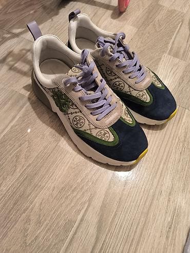 qaçış üçün qadın krosovkaları: Tory Burch qadın idman ayaqqabısı
- Orjinal — 2