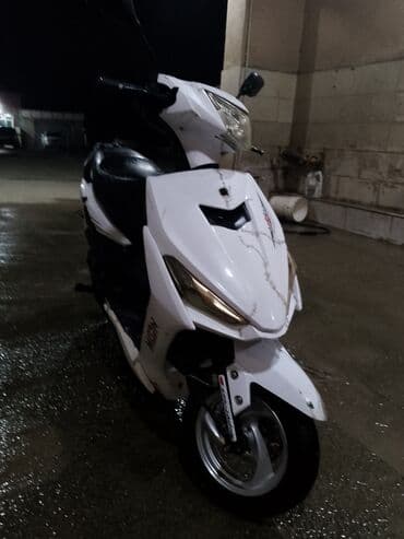 купить мопед бу: Şəhər içi üçün yığcam və çevik skuter. Xüsusiyyətlər: - Kuzov rəngi — 4