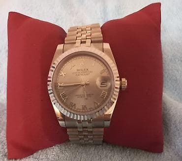 Личные вещи: Rolex saat oz qabinda — 2