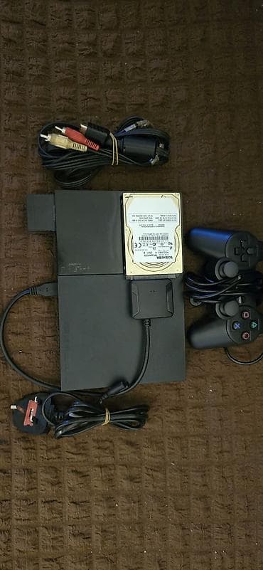 PlayStation 2 hard disqle isdifade olunur icində 300 e yaxın oyun var