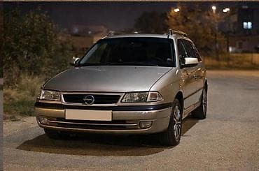 duman: Opel Astra: 1.6 l | Universal — 1