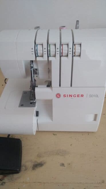 Overlok maşini az islenmis. arxa rezininde bir az cat var ancaq