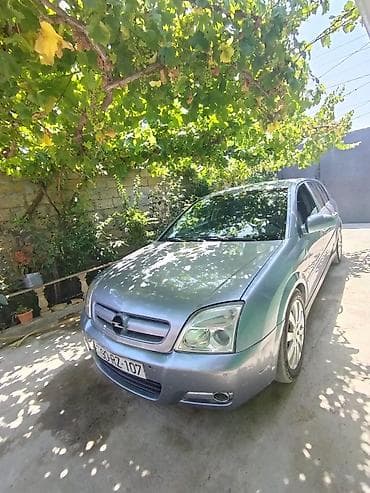 diskler 16: Opel Vectra C sedan, boz-metal rəng. - Kuzov: 4 qapılı sedan — 3