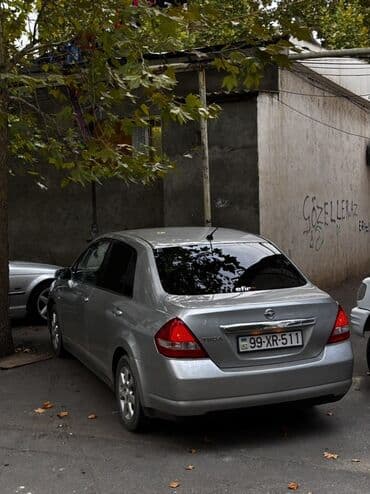 mersedes disk r15: Nissan Tiida: 1.6 l | 2006 il Sedan — 3