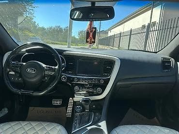 Proton: Kia Optima – ağ rəngli, sedan kuzov. Fotoşəkillərdə görünən — 7