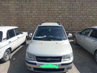 yeşqa maşın: Hyundai Matrix, ağ rəng, şəhərdaxili və ailə istifadəsi üçün praktik — 5