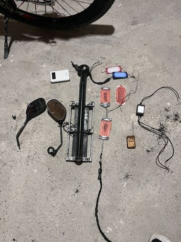 balıq tor: Velosiped – dağ/şəhər tipli, qırmızı rəng. Xüsusiyyətlər: - Güclü — 7