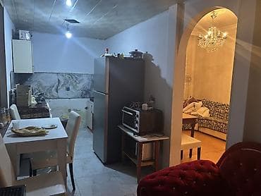 1 otaql: 1 otaqlı mənzil – mətbəx-studiya, sanitar qovşaq və qonaq otağı — 2