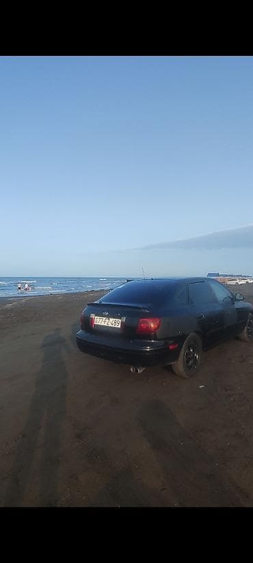 hyundai getz: Hyundai Elantra: 2 l | 2003 il Sedan — 4