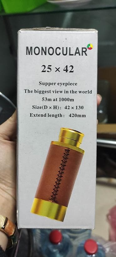 binokl: 25x42 ölçülü monokulyar. 1000 metrdə 53 metrə qədər böyütmə — 2