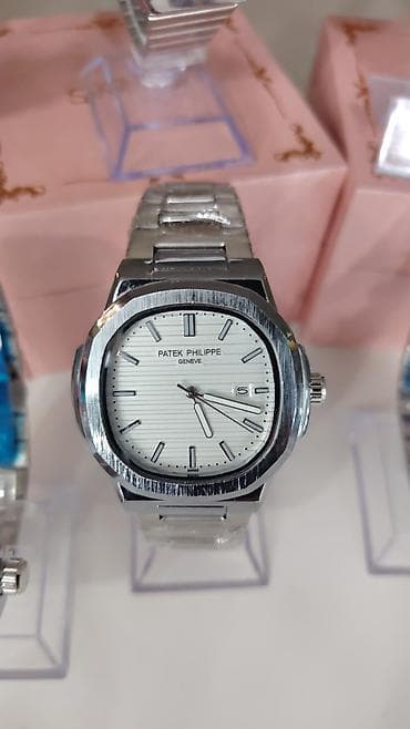 elektrikli saat: Patek Philippe tərzində analoq qol saatları – klassik Nautilus dizaynı — 3