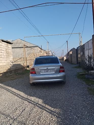 Motonəqliyyat: Opel Vectra: 1.8 l | 1997 il 400000 km Sedan — 6